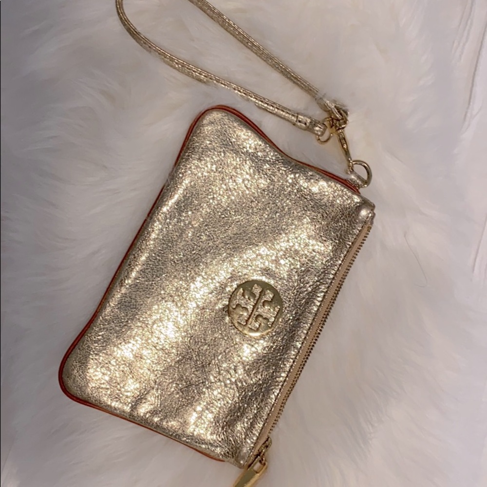 Gold Tory Burch wristlet